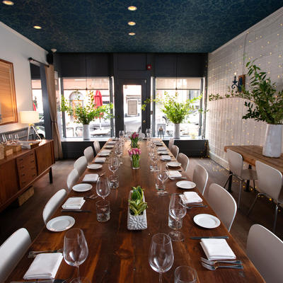 Interior, big dining table set for guests