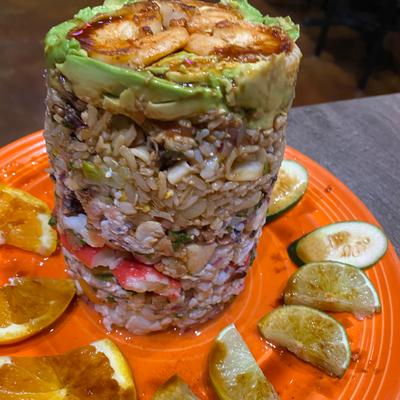 Seafood tower with shrimp, crabmeat, and avocado.