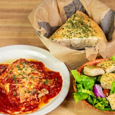 Lasagna, salad, and garlic bread.