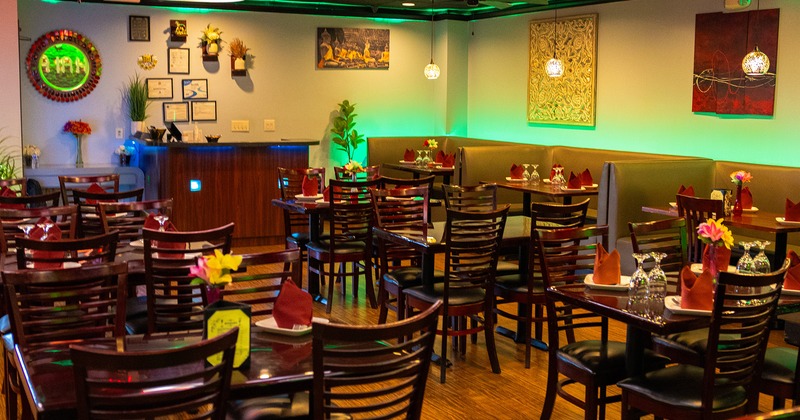 Restaurant interior, dining area with set tables