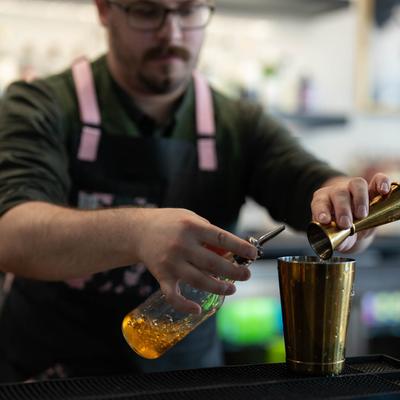 Bartender pouring a drink..