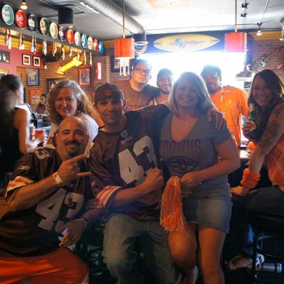 A group of fans posing for a photo