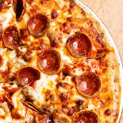 Sausage Pepperoni Pizza, partial view.