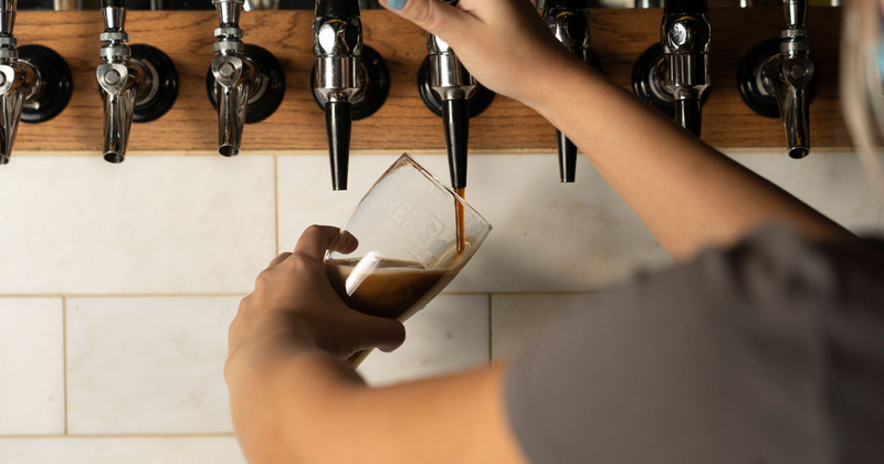 Poruing beer from the tap