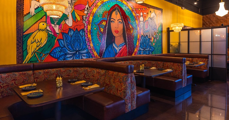 Interior, booths, big mural on the wall