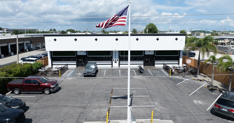 Exterior, aerial view to restaurany and parking lot in front