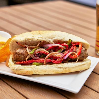 Sausage sandwich, with grilled onions and peppers.