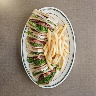 Club Sandwich with fries.