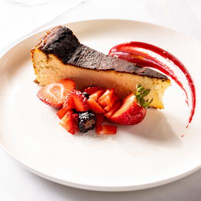 Cheesecake, with strawberries.