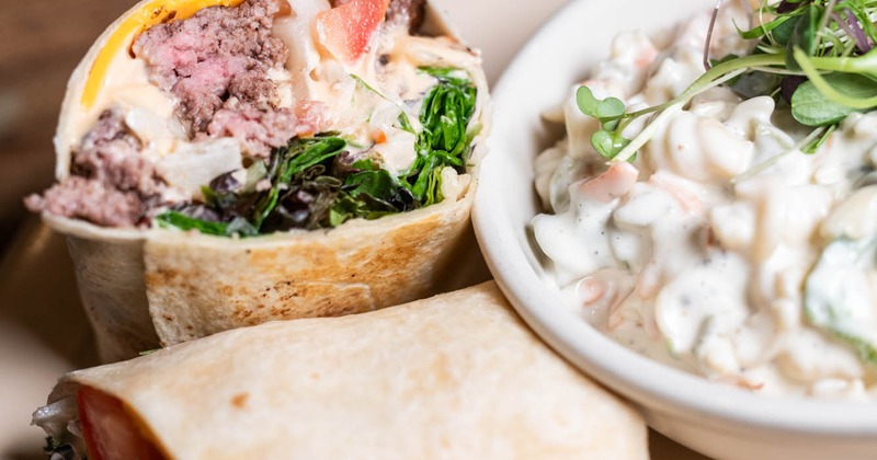 Steak wrap, served with pasta salad