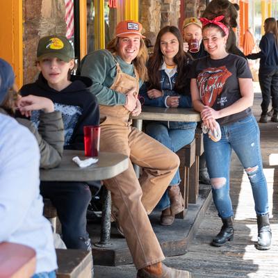 Lots of guests outside on the patio.