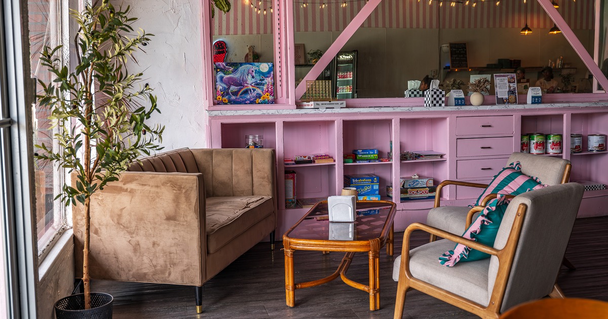 A modern-rustic and cozy restaurant interior, comfortable lounge seating corner