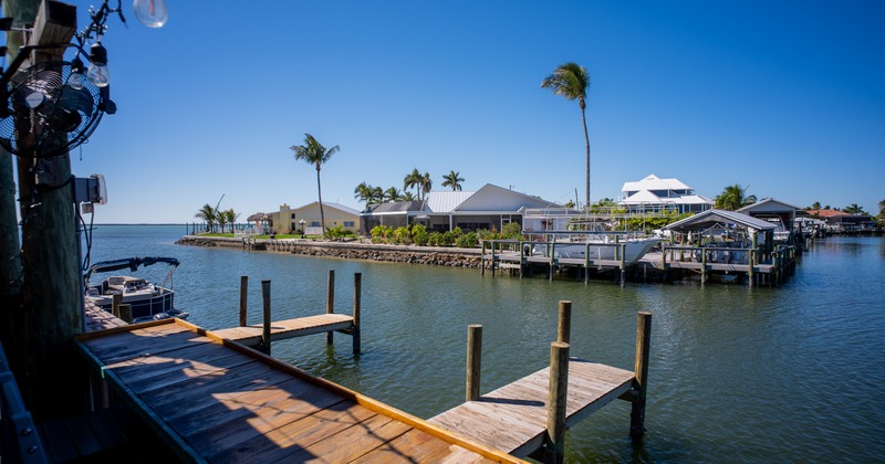 Docks for boats made of planks on wooden posts