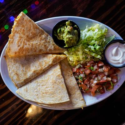 Tortillas with pico de gallo, lettuce, guacamole dip and dressing