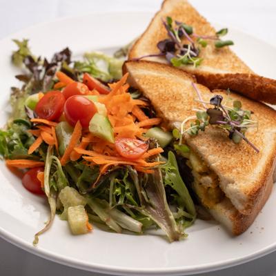 Moroccan Sandwich served with a side salad.