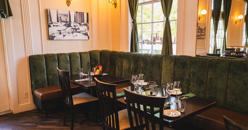 Interior, seating bench, tables and chairs in dining area