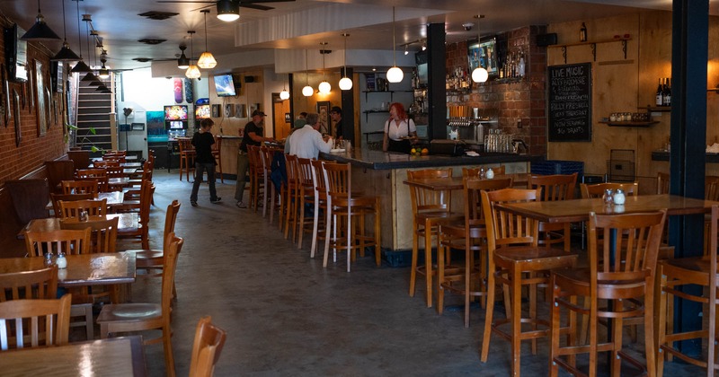 Interior, tables and chairs ready for guests