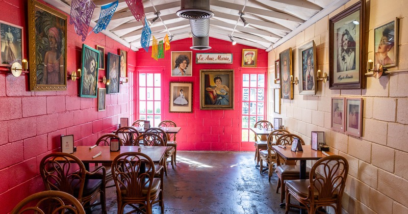 Interior, dining area with pictures on the wall
