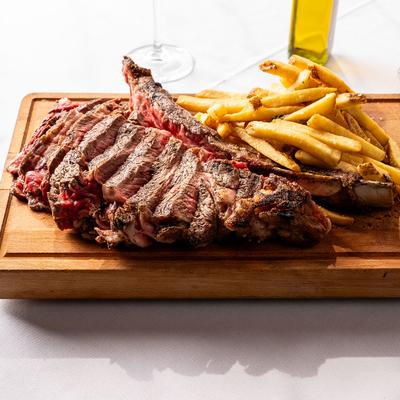 Tomahawk steak and fries.