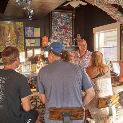 Guests sitting at the bar counter.