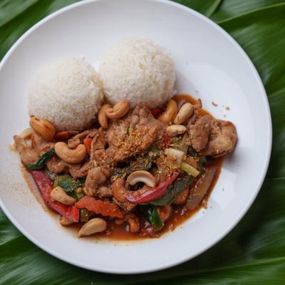 Chicken Cashew Nut Stir - Fry with bell peppers and side of rice.