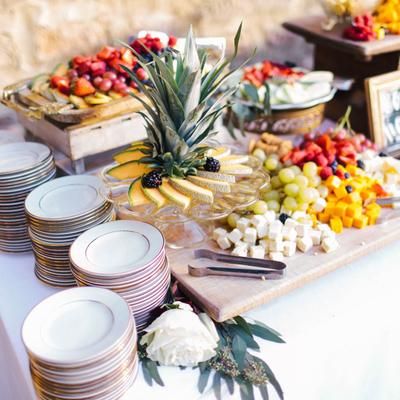 A served buffet and plates.