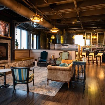 Interior, a small lounge area with a fireplace.