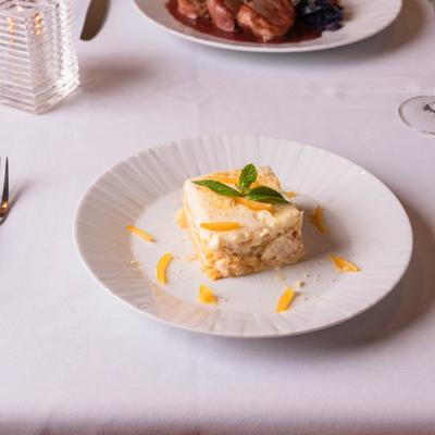 Orange Tiramisu garnished with a mint spring.