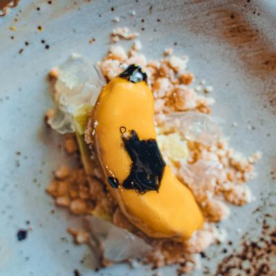 Sweet banana, white chocolate and almond crumble.