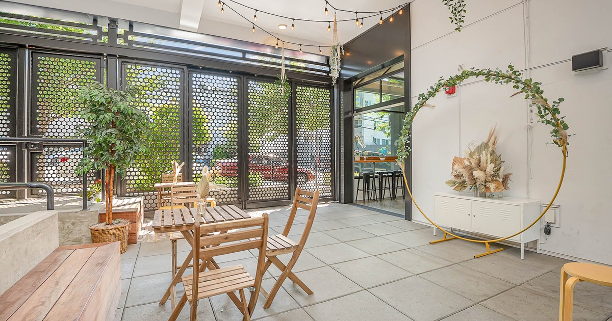 Wooden tables and chairs, floral decorations