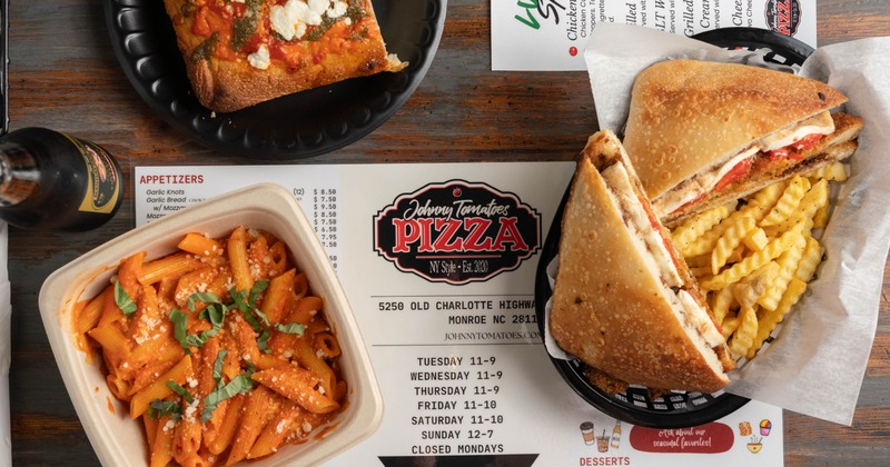 Variety of dishes served on the table with menues