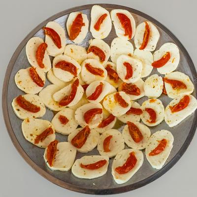 Fresh Mozzarella, topped with sun dried tomatoes.