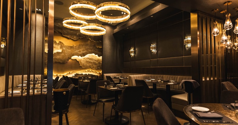 Interior, dining area, regular tables for two, ''U'' shaped seating booths with tables