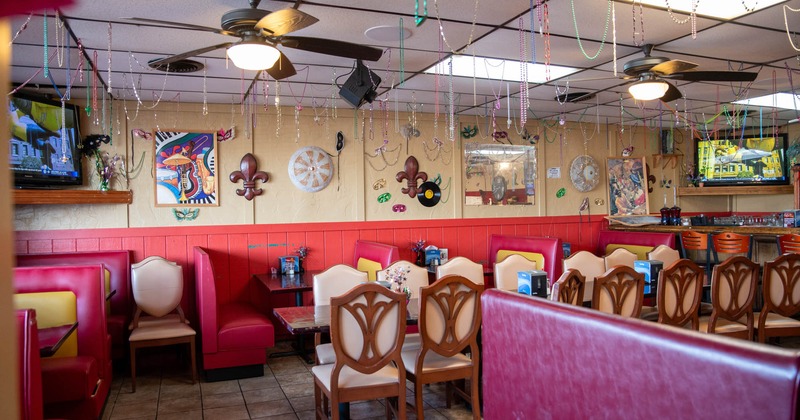 Interior, long dining table, chairs, booths, decoration