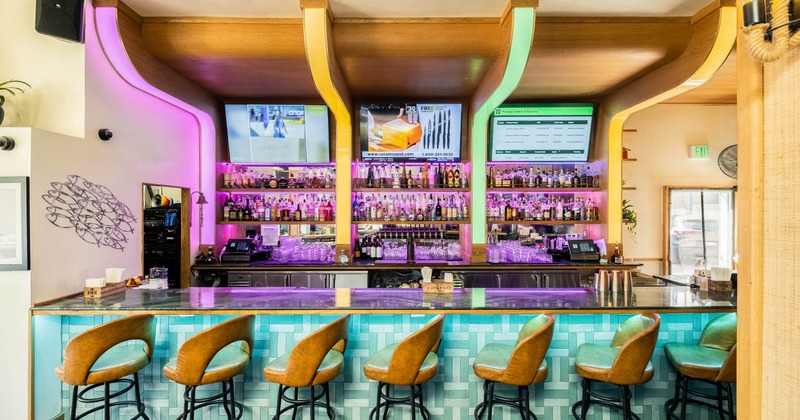Bar area, neatly lined up bar stools
