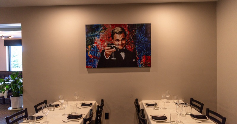 Interior, tables set for guests,  dining area