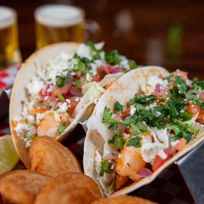 Baja Shrimp Tacos and fries.