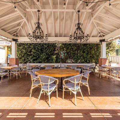 The outdoor patio dining area of the Branch Street Deli & Pizzeria.