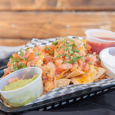 Nacho basket with Salsa, Guacamole and Sour Cream