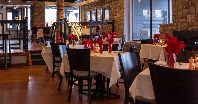 Interior, tables ready for guests at the dining area