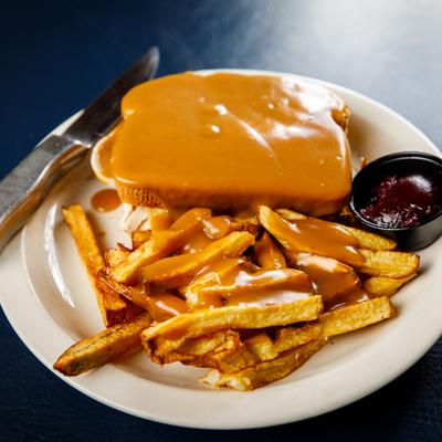 Hot turkey sandwich with tavern made fries.