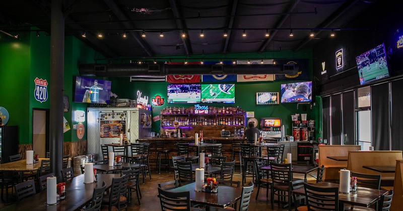 Pub interior, seating area, dining tables and bar area