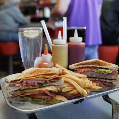 ham sandwiches with fries and a limeade.