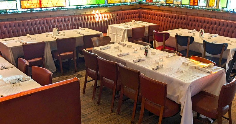 Long table set for guests for private party