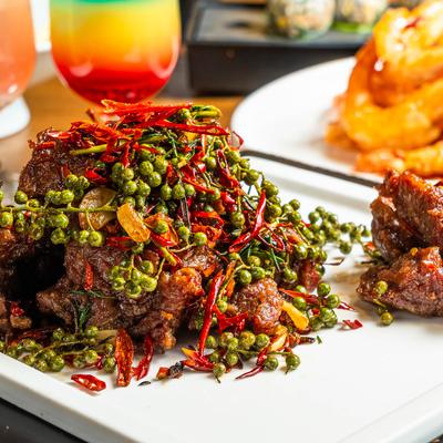 Braised beef, with pepper sauce.