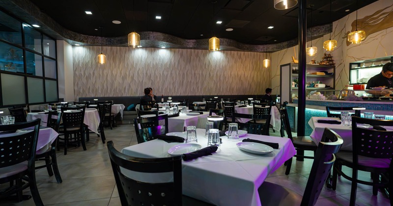 Dining area, fully set tables