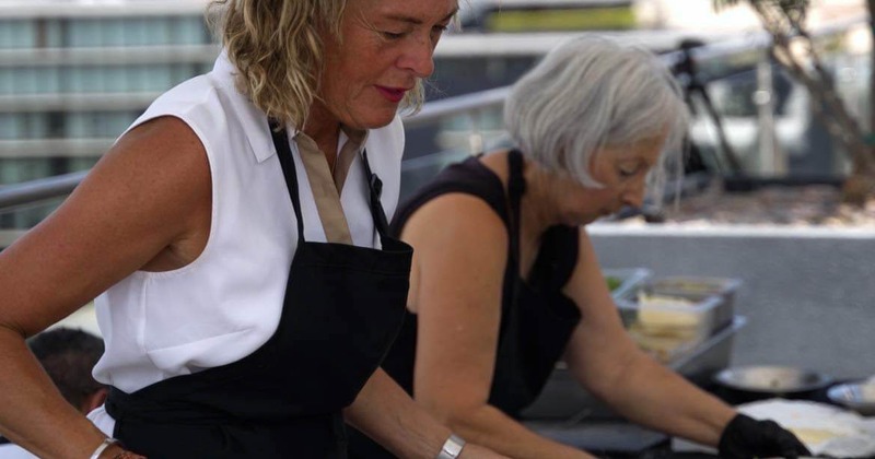 Owner Isabelle preparing crepes