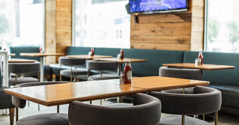 Interior, main seating with TV on the wall