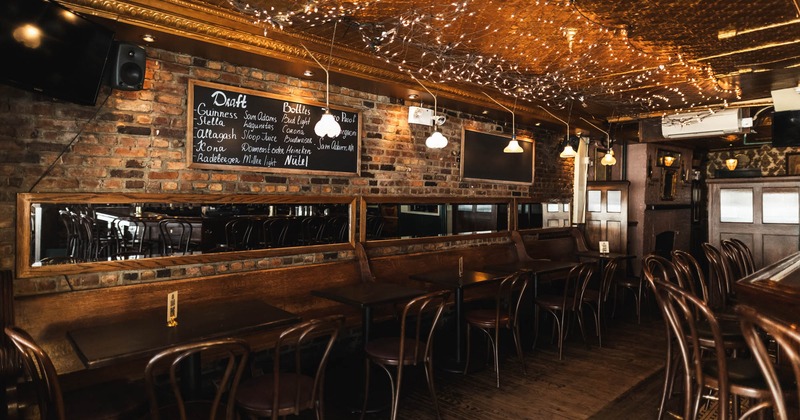 Interior, seating area, tables, chairs and banquette seating