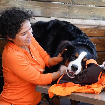 One of guests with the dog on photo, laughing